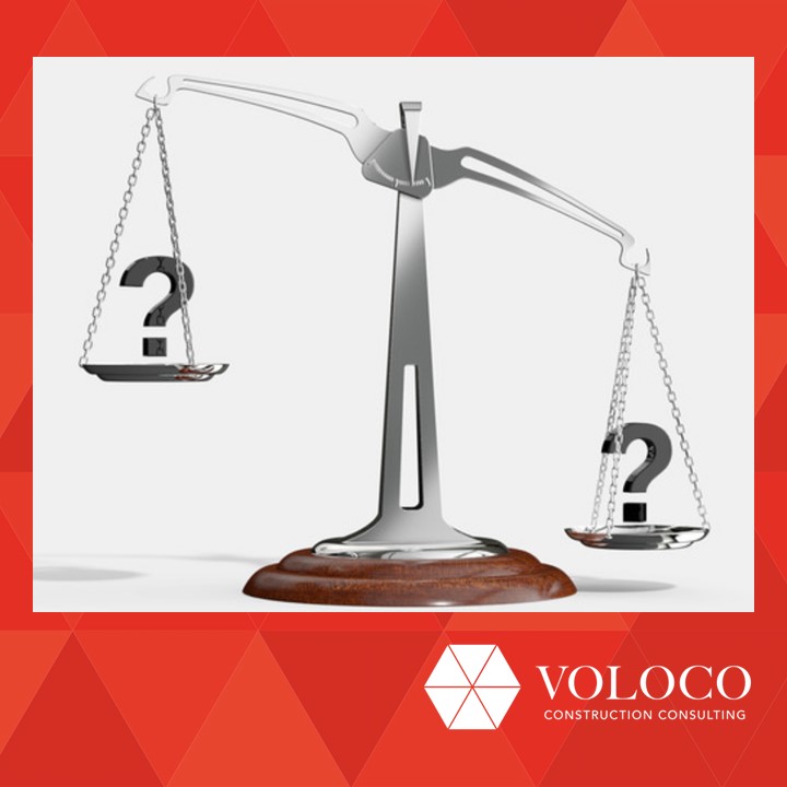 Question mark symbols on scales with VOLOCO branding